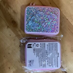 One Claire's Pink Glitter Butterfly makeup set includes eyeshadow, 3 gloss